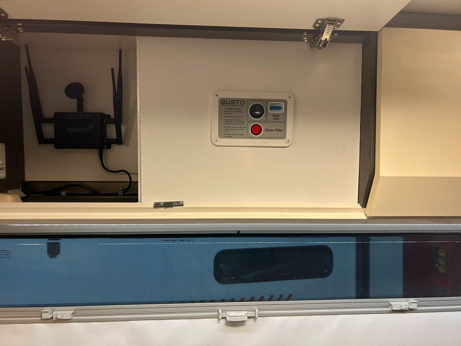 Gusto DRS 12V control panel and 15A fuse mounted inside an overhead caravan cupboard, wired by a licensed technician at G&S Caravan Services