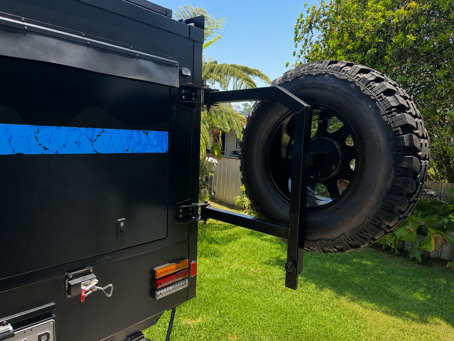 Custom caravan spare wheel relocation mid-install by G&S Caravan Services technicians